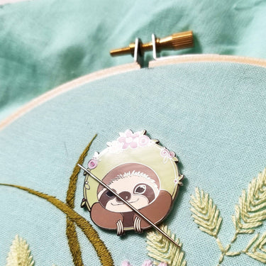 Translation missing: en.Happy Sloth Enamel Needle Minder